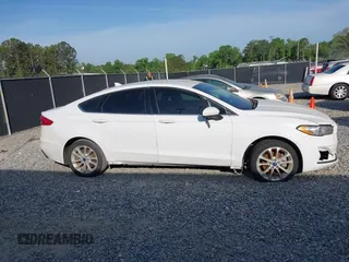 2019 Ford Fusion SE with VIN 3FA6P0LU6KR152166, listed as a IAAI auction lot 42086365 with 158,557 mi miles and . Bid and sale history available at DreamBid. Image 13.