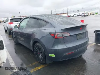 2023 Tesla Model Y Performance with VIN 7SAYGDEF0PF774282, listed as a IAAI auction lot 41807031 with Not Provided miles and . Bid and sale history available at DreamBid. Image 3.