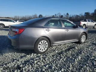 2014 Toyota Camry Hybrid LE with VIN 4T1BD1FK5EU127639, listed as a Copart auction lot 89308455 with 105,679 mi miles and Salvage Title. Bid and sale history available at carsss.com. Image 3.