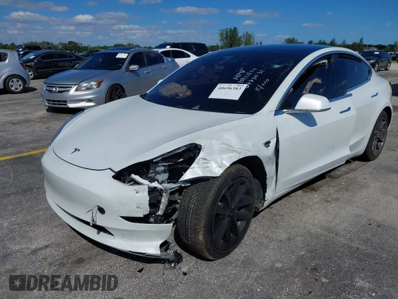 2020 Tesla Model 3 Standard Range Plus with VIN 5YJ3E1EA8LF783631, listed as a IAAI auction lot 40696383 with 78,889 mi miles. Bid and sale history available at carsss.com. Image 6.