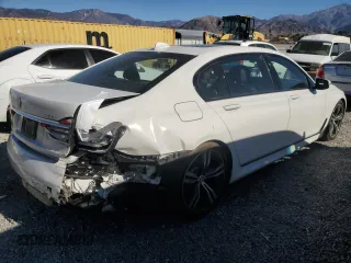 2019 BMW 7 Series 750i с VIN WBA7F0C53KGM25787, выставлен на аукционе Copart как лот 88172835 с пробегом 71 267 миль миль и Списание • Salvage title. История ставок и продаж доступна на DreamBid. Изображение 3.