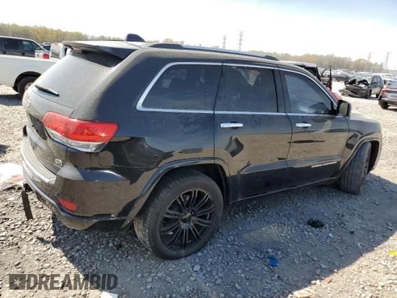 2015 Jeep Grand Cherokee Overland with VIN 1C4RJFCG3FC104439, listed as a Copart auction lot 50780295 with 196,549 mi miles and Salvage Title. Bid and sale history available at carsss.com. Image 3.