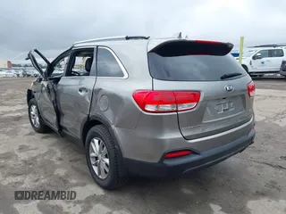2016 Kia Sorento LX with VIN 5XYPG4A35GG149678, listed as a IAAI auction lot 41478731 with 128,895 mi miles. Bid and sale history available at carsss.com. Image 3.