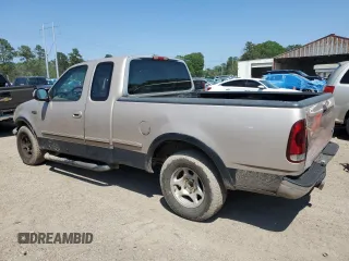 1997 Ford F-150 XL z VIN 1FTEX17LXVNB11737, wystawiony jako Copart lot #52624175 z przebiegiem 94 897 mil mil oraz Szkoda całkowita • Salvage title. Historia ofert i sprzedaży dostępna na DreamBid. Obrazek 2.