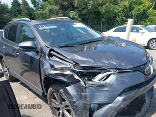 2018 Toyota RAV4 XLE with VIN JTMWFREV9JJ201845, listed as a IAAI auction lot 42442303 with 111,177 mi miles and . Bid and sale history available at DreamBid. Image 1.