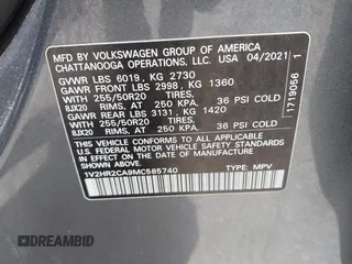 2021 Volkswagen Atlas SE with VIN 1V2HR2CA9MC585740, listed as a IAAI auction lot 42279757 with 64,995 mi miles and . Bid and sale history available at DreamBid. Image 9.