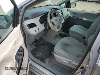 2014 Toyota Sienna L with VIN 5TDZK3DC8ES442973, listed as a Copart auction lot 59660055 with 310,496 mi miles and Salvage title. Bid and sale history available at DreamBid. Image 8.
