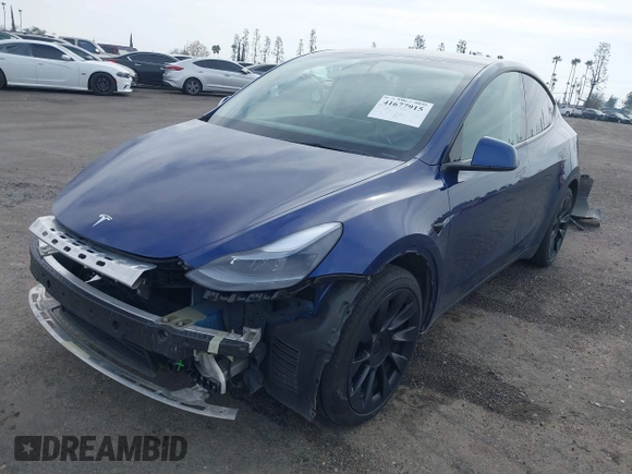 2021 Tesla Model Y Long Range with VIN 5YJYGAEE5MF199286, listed as a IAAI auction lot 41677915 with 52,500 mi miles. Bid and sale history available at carsss.com. Image 18.