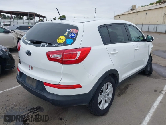2013 Kia Sportage LX with VIN KNDPBCA21D7356092, listed as a IAAI auction lot 42111086 with 102,521 mi miles and . Bid and sale history available at carsss.com. Image 4.