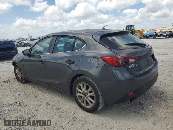 2014 Mazda 3 i Touring with VIN JM1BM1L76E1211443, listed as a Copart auction lot 54767085 with 148,388 mi miles and Salvage Title. Bid and sale history available at DreamBid. Image 2.