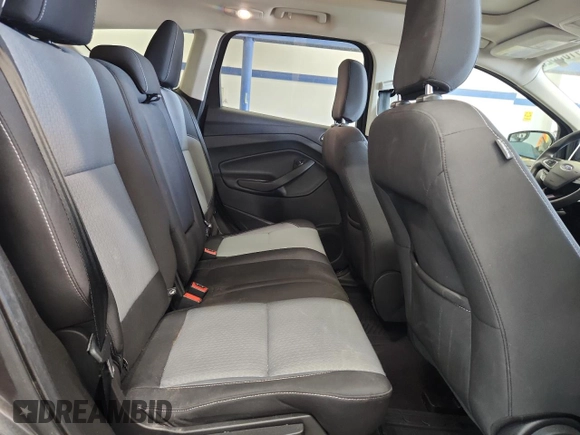 2018 Ford Escape SE z VIN 1FMCU9GD0JUC61682, wystawiony jako Copart lot #59105625 z przebiegiem 85 146 mil mil oraz Czysty tytuł • Clean title. Historia ofert i sprzedaży dostępna na DreamBid. Obrazek 10.