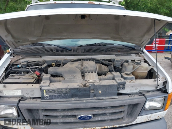 2007 Ford Econoline Cargo Commercial with VIN 1FTNE24L17DA50691, listed as a IAAI auction lot 42754142 with 213,906 mi miles and . Bid and sale history available at DreamBid. Image 10.