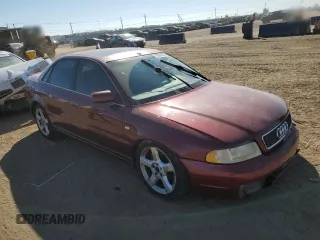 2000 Audi S4 z VIN WAUDD68DXYA127728, wystawiony jako Copart lot #75094394 z przebiegiem 164 612 mil mil oraz Szkody całkowita. Historia ofert i sprzedaży dostępna na DreamBid. Obrazek 4.