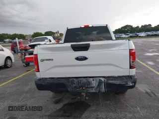 2015 Ford F-150 XL with VIN 1FTEX1CP7FFB56879, listed as a IAAI auction lot 42414408 with 212,042 mi miles and . Bid and sale history available at DreamBid. Image 16.