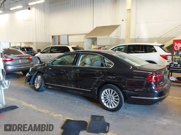 2017 Volkswagen Passat SE with VIN 1VWBT7A30HC019849, listed as a IAAI auction lot 42450723 with 73,236 mi miles and . Bid and sale history available at DreamBid. Image 3.