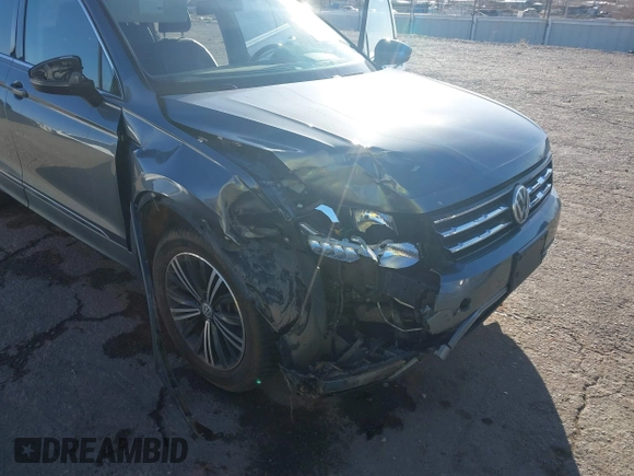 2018 Volkswagen Tiguan SEL z VIN 3VV3B7AXXJM088230, wystawiony jako IAAI lot #41680855 z przebiegiem 130 807 mil mil oraz . Historia ofert i sprzedaży dostępna na DreamBid. Obrazek 6.