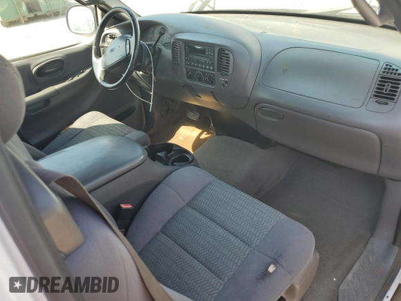 2002 Ford F-150 XL with VIN 1FTRX07W52KB08618, listed as a Copart auction lot 57941974 with 172,843 mi miles and Salvage title. Bid and sale history available at DreamBid. Image 8.