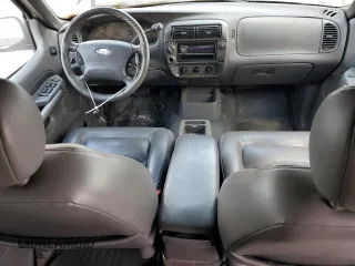 2002 Ford Explorer z VIN 1FMZU77F81UA77971, wystawiony jako Copart lot #58494644 z przebiegiem 156 594 mil mil oraz Szkoda całkowita • Salvage title. Historia ofert i sprzedaży dostępna na DreamBid. Obrazek 8.