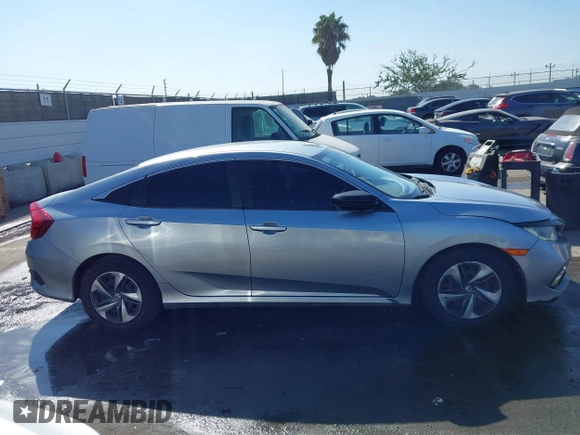 2020 Honda Civic LX with VIN 2HGFC2F6XLH533726, listed as a IAAI auction lot 41633882 with 141,835 mi miles and . Bid and sale history available at DreamBid. Image 13.