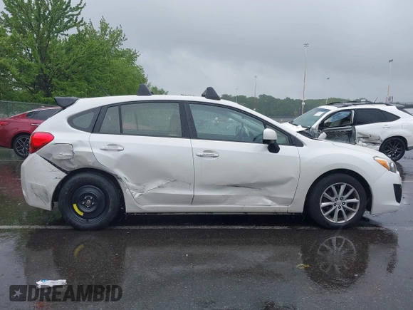 2014 Subaru Impreza Premium z VIN JF1GPAC68E8310797, wystawiony jako IAAI lot #42258193 z przebiegiem 104 260 mil mil oraz . Historia ofert i sprzedaży dostępna na DreamBid. Obrazek 13.