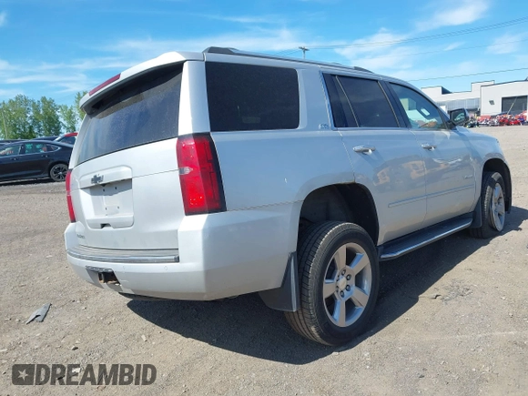 2016 Chevrolet Tahoe LTZ with VIN 1GNSKCKC1GR452600, listed as a IAAI auction lot 42305719 with 121,041 mi miles and . Bid and sale history available at DreamBid. Image 4.