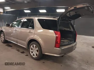 2007 Cadillac SRX with VIN 1GYEE637370137893, listed as a IAAI auction lot 41869395 with 215,460 mi miles. Bid and sale history available at carsss.com. Image 3.