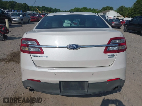 2015 Ford Taurus SEL with VIN 1FAHP2E97FG149657, listed as a IAAI auction lot 42400856 with 138,386 mi miles and . Bid and sale history available at DreamBid. Image 16.