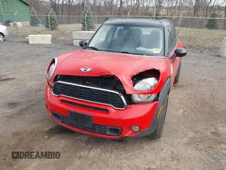 2012 MINI Countryman S z VIN WMWZC3C52CWM26424, wystawiony jako IAAI lot #41828011 z przebiegiem 145 678 mil mil oraz . Historia ofert i sprzedaży dostępna na DreamBid. Obrazek 6.