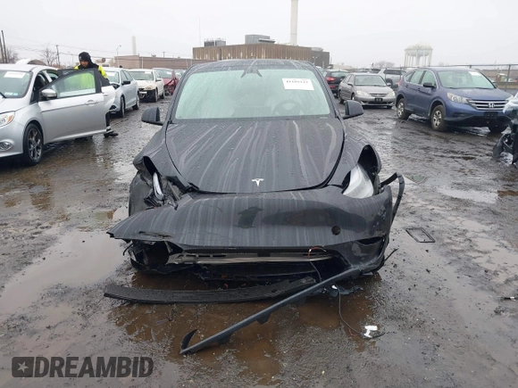 2025 Tesla Model Y Long Range with VIN 7SAYGDED6SF226035, listed as a IAAI auction lot 41102115 with Not Provided miles and . Bid and sale history available at DreamBid. Image 12.