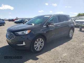 2021 Ford Edge Titanium with VIN 2FMPK3K95MBA15874, listed as a Copart auction lot 57915775 with 80,558 mi miles and Salvage title. Bid and sale history available at DreamBid. Image 1.