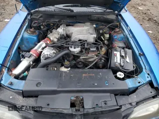 1994 Ford Mustang z VIN 1FALP45T2RF214782, wystawiony jako Copart lot #83860474 z przebiegiem 164 464 mil mil oraz Szkoda całkowita • Salvage title. Historia ofert i sprzedaży dostępna na DreamBid. Obrazek 11.