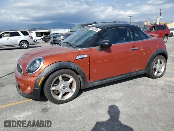 2013 MINI Coupe S z VIN WMWSX3C59DT466802, wystawiony jako Copart lot #56860965 z przebiegiem 88 053 mil mil oraz Szkoda całkowita • Salvage title. Historia ofert i sprzedaży dostępna na DreamBid. Obrazek 1.