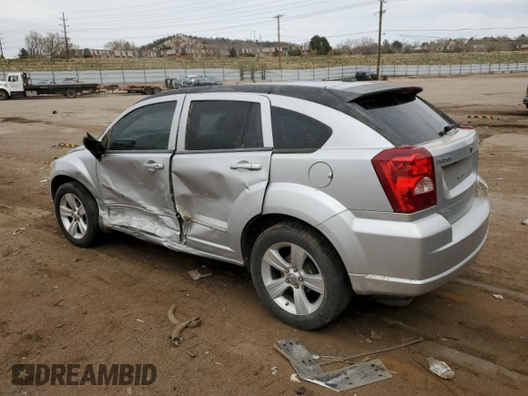 2011 Dodge Caliber Mainstreet with VIN 1B3CB3HA6BD182726, listed as a Copart auction lot 50909755 with 99,305 mi miles and Salvage Title. Bid and sale history available at carsss.com. Image 2.