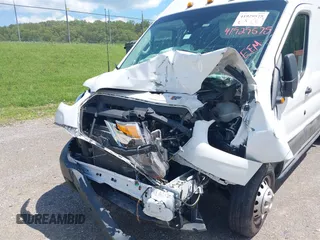 2021 Ford Transit Cargo z VIN 1FTBF4X81MKA80705, wystawiony jako IAAI lot #41929575 z przebiegiem Nie podano mil oraz . Historia ofert i sprzedaży dostępna na DreamBid. Obrazek 6.