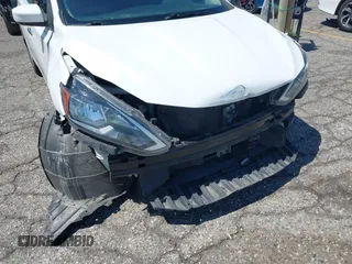 2019 Nissan Sentra SV with VIN 3N1AB7AP8KY296528, listed as a IAAI auction lot 40254265 with 57,196 mi miles and . Bid and sale history available at DreamBid. Image 6.