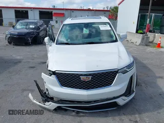 2023 Cadillac XT6 FWD Premium Luxury with VIN 1GYKPCRS3PZ186210, listed as a IAAI auction lot 42290027 with 44,117 mi miles and . Bid and sale history available at DreamBid. Image 12.