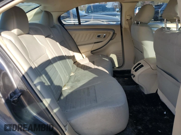 2015 Ford Taurus SE with VIN 1FAHP2D86FG184747, listed as a Copart auction lot 77659254 with 140,404 mi miles and Clean Title. Bid and sale history available at carsss.com. Image 10.