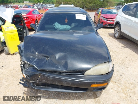 1996 Toyota Camry LE z VIN 4T1EF12K9TU117514, wystawiony jako IAAI lot #42241880 z przebiegiem 192 764 mil mil oraz . Historia ofert i sprzedaży dostępna na DreamBid. Obrazek 12.