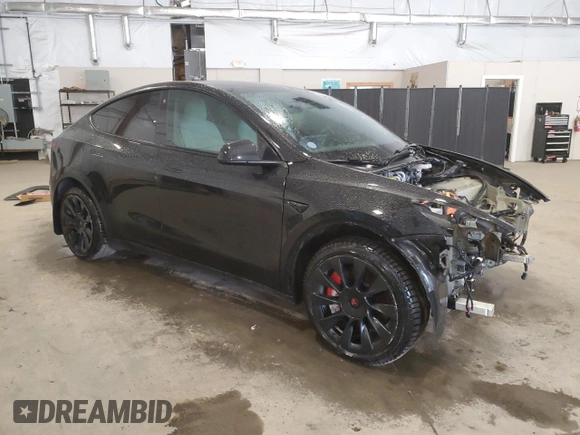 2021 Tesla Model Y Long Range with VIN 5YJYGDEE8MF252824, listed as a Copart auction lot 53801315 with 31,084 mi miles and Salvage Title. Bid and sale history available at DreamBid. Image 4.