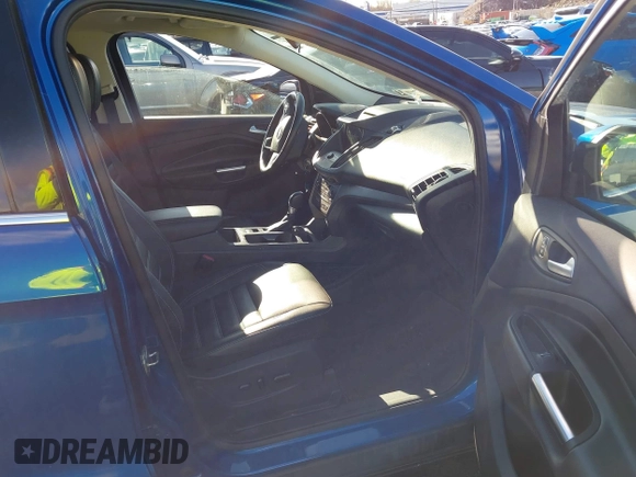 2017 Ford Escape SE with VIN 1FMCU9G91HUE28282, listed as a IAAI auction lot 41471957 with 23,552 mi miles. Bid and sale history available at carsss.com. Image 5.