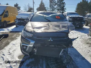 2018 Mitsubishi Outlander SEL z VIN JA4AR4AW5JZ016013, wystawiony jako Copart lot #87653585 z przebiegiem Nie podano mil oraz Szkody całkowita. Historia ofert i sprzedaży dostępna na DreamBid. Obrazek 5.