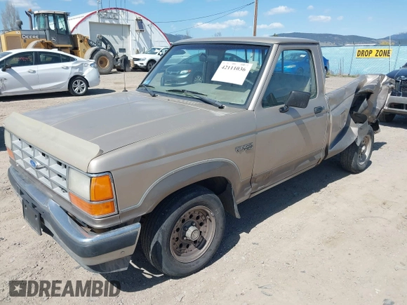 1990 Ford Ranger with VIN 1FTCR10T5LPB09214, listed as a IAAI auction lot 42111036 with 61,289 mi miles and . Bid and sale history available at DreamBid. Image 2.