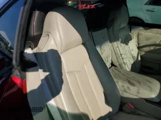 2006 Cadillac XLR z VIN 1G6YV36A465601366, wystawiony jako Copart lot #76229944 z przebiegiem 33 159 mil mil oraz Nie do naprawy. Historia ofert i sprzedaży dostępna na DreamBid. Obrazek 10.