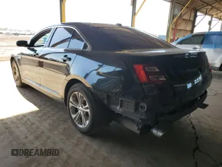 2015 Ford Taurus SEL with VIN 1FAHP2E82FG132241, listed as a Copart auction lot 53970065 with 114,947 mi miles and Salvage Title. Bid and sale history available at carsss.com. Image 2.
