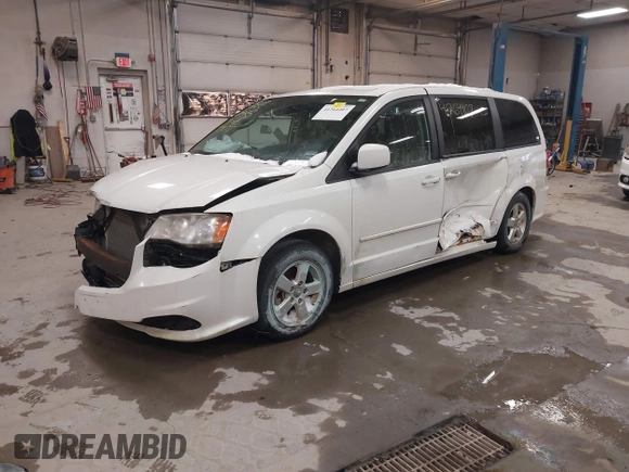 2012 Dodge Grand Caravan SXT with VIN 2C4RDGCG3CR405373, listed as a IAAI auction lot 41264407 with 164,019 mi miles and . Bid and sale history available at DreamBid. Image 2.