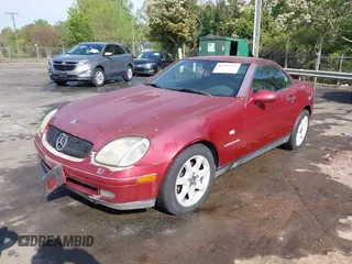 1999 Mercedes-Benz SLK-Class with VIN WDBKK47F0XF088123, listed as a IAAI auction lot 41991751 with 275,370 mi miles. Bid and sale history available at carsss.com. Image 2.