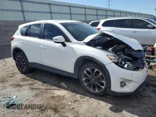 2016 Mazda CX-5 Grand Touring with VIN JM3KE2DY0G0888854, listed as a Copart auction lot 68379754 with 73,096 mi miles and Salvage Title. Bid and sale history available at carsss.com. Image 4.