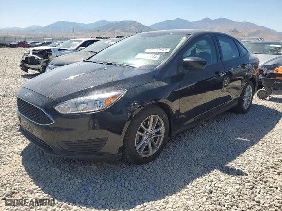 2018 Ford Focus SE with VIN 1FADP3F29JL262175, listed as a Copart auction lot 69452444 with 105,830 mi miles and Salvage Title. Bid and sale history available at carsss.com. Image 1.