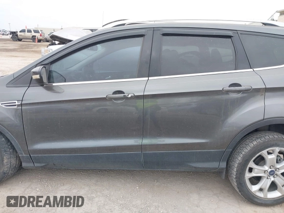 2016 Ford Escape Titanium with VIN 1FMCU0J9XGUC58149, listed as a IAAI auction lot 41739005 with 111,594 mi miles. Bid and sale history available at carsss.com. Image 13.