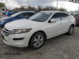 2010 Honda Crosstour EX-L z VIN 5J6TF1H51AL010452, wystawiony jako Copart lot #53786595 z przebiegiem 137 488 mil mil oraz Szkody całkowita. Historia ofert i sprzedaży dostępna na DreamBid. Obrazek 1.